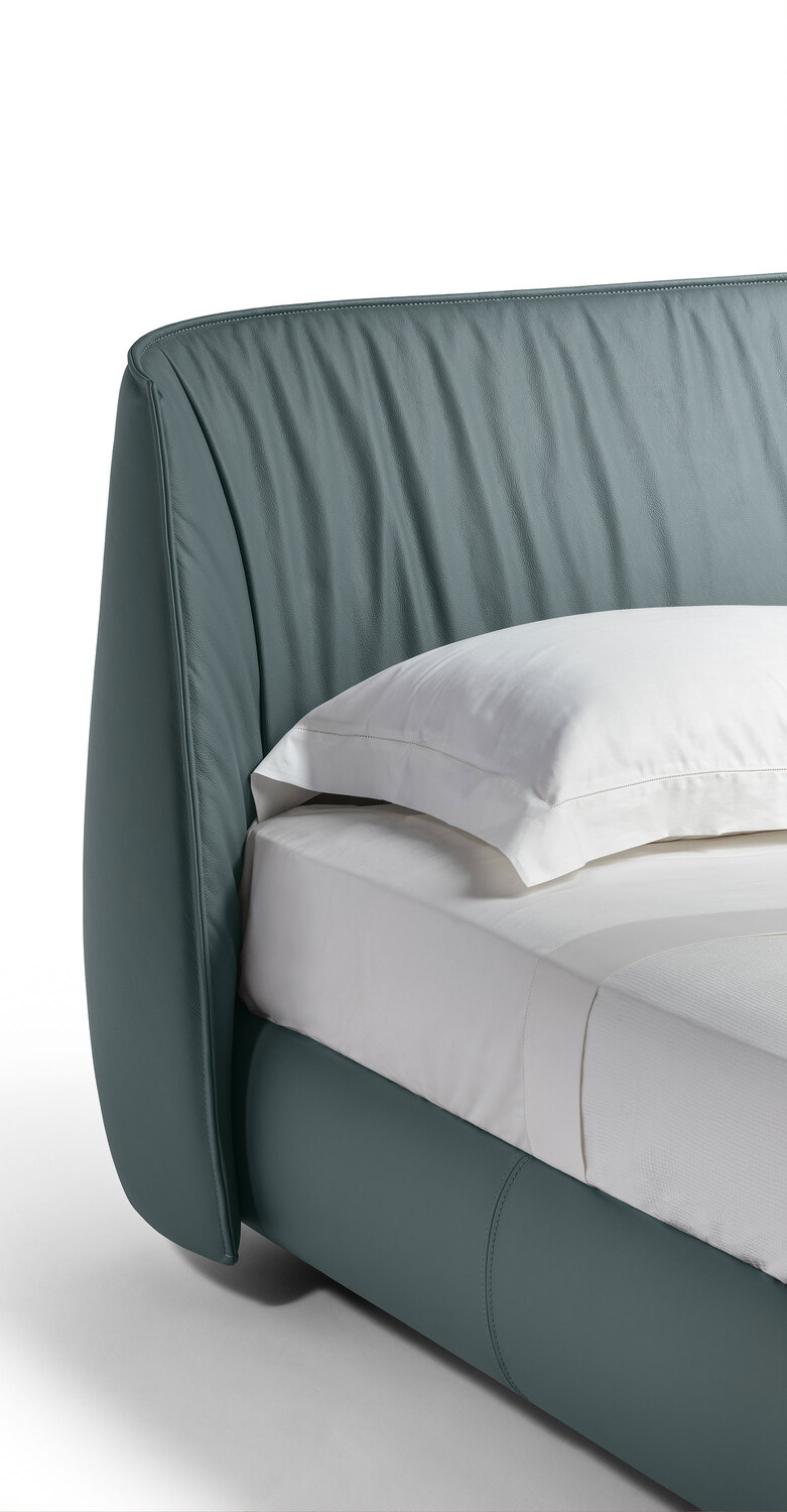 Archibald | Bed with storage Archibald bed with integrated storage, upholstered in Pelle Frau®, a blend of functionality and Italian style.