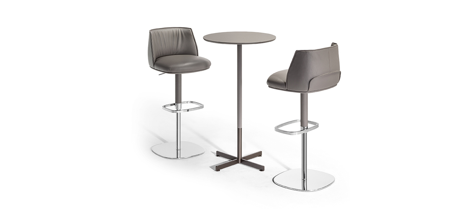 Bob Bistrot round table h.110 by Poltrona Frau, Jean-Marie Massaud design, cross-shaped brushed steel base, Fenix NTM® or Calacatta gold marble top, versatile Italian luxury for hospitality and contract spaces