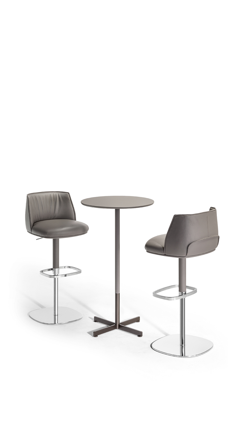 Bob Bistrot round table h.110 by Poltrona Frau, Jean-Marie Massaud design, cross-shaped brushed steel base, Fenix NTM® or Calacatta gold marble top, versatile Italian luxury for hospitality and contract spaces