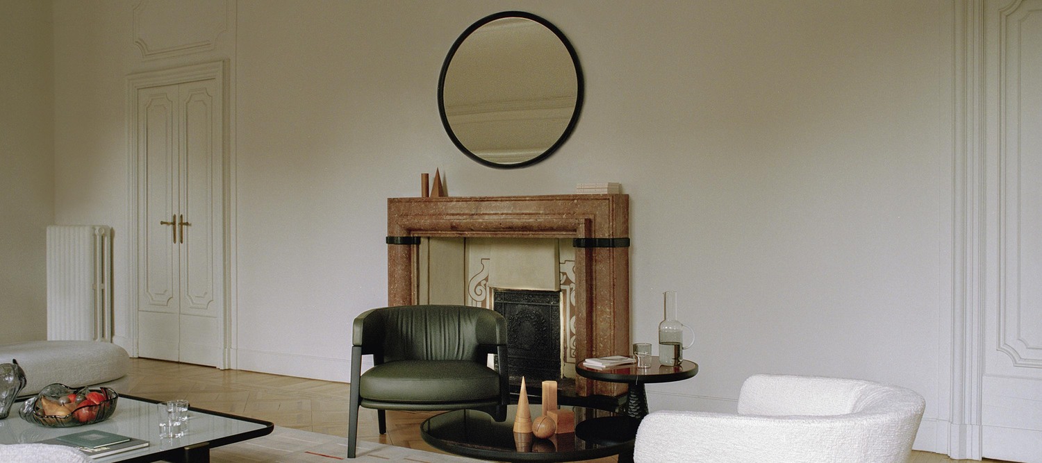 DUO mirror by Poltrona Frau, with solid wood frame and Italian artisanal details.