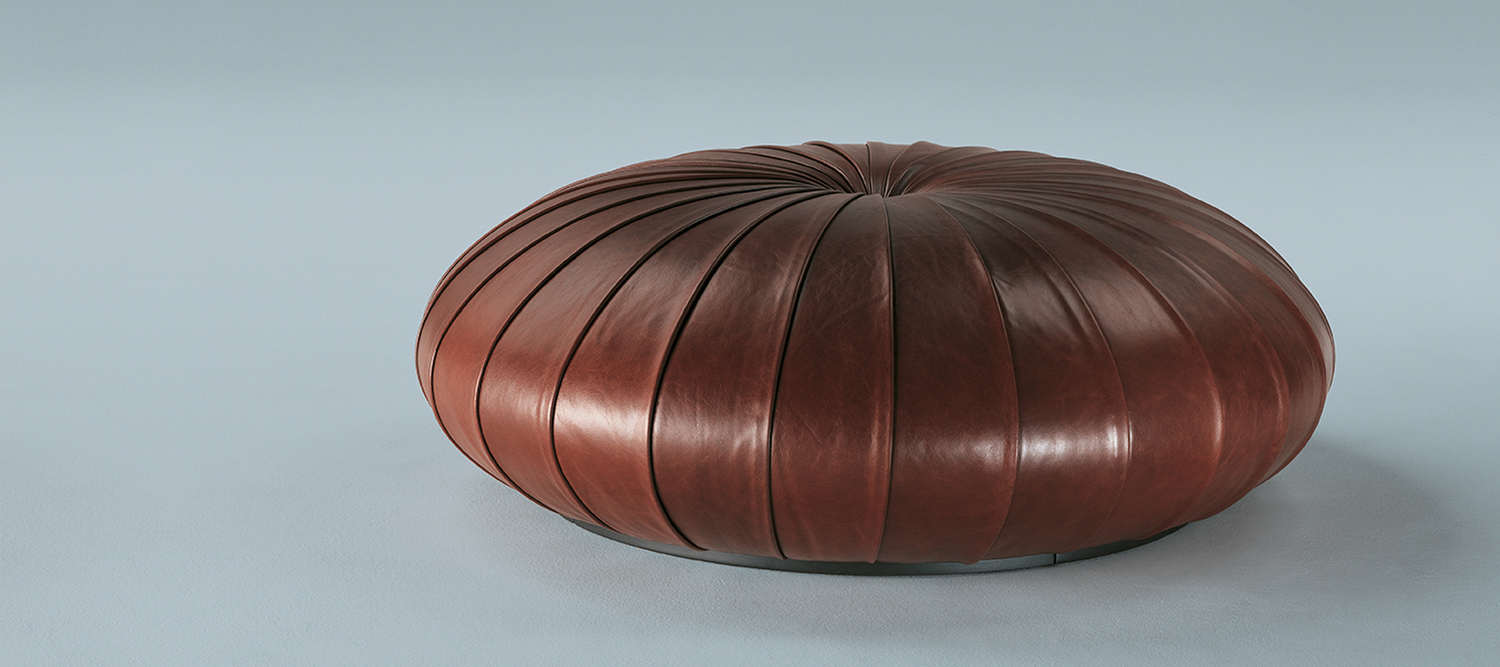 Esedra | Ottoman Esedra ottoman by Poltrona Frau with internal birch plywood and solid beech structure, black lacquered scratch-resistant wood base, polyurethane foam padding, Pelle Frau® leather upholstery