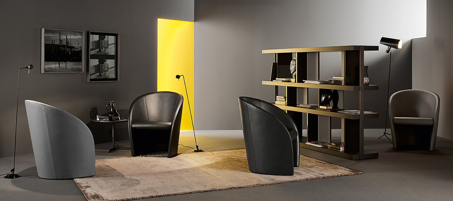 Intervista | Poltrona Poltrona Intervista Poltrona Frau in Pelle Frau®, struttura in acciaio e poliuretano, design italiano firmato Vignelli, comfort avvolgente