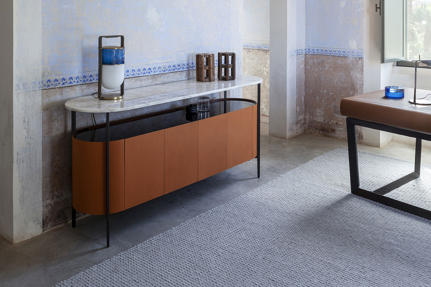 Mi | Low cabinet Mi Low Cabinet by Poltrona Frau, canneté Saddle Extra leather upholstery, Calacatta Oro or Nero Marquinia marble top, burnished metal frame, Canaletto walnut details, contemporary design with three-dimensional texture