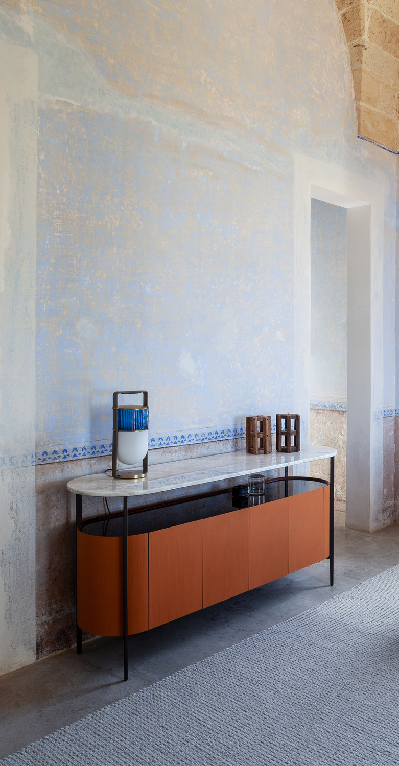 Mi | Low cabinet Mi Low Cabinet by Poltrona Frau, canneté Saddle Extra leather upholstery, Calacatta Oro or Nero Marquinia marble top, burnished metal frame, Canaletto walnut details, contemporary design with three-dimensional texture