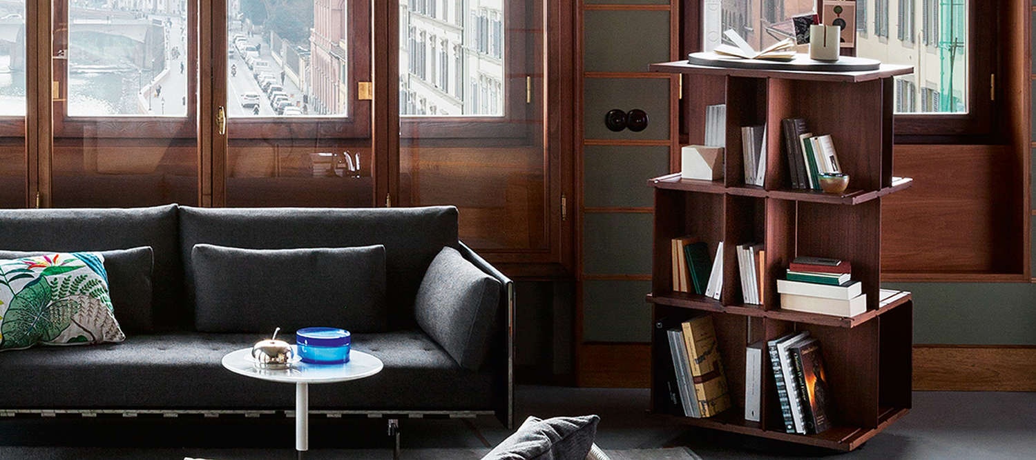 Turner | Bookcase The Turner Bookcase by Poltrona Frau is a rotating bookcase that combines fine wood with Pelle Frau® leather inserts. With clean lines and harmonious proportions, it blends functionality and design to furnish with elegance.